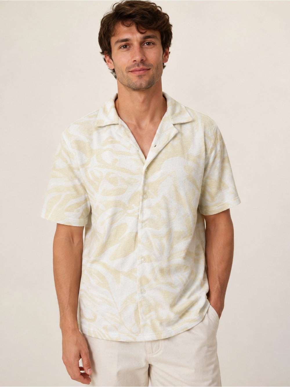 Universal Standard Short-Sleeve Button-Down in Cream and White Abstract